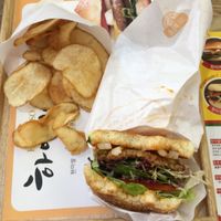 half eaten salad burger + fries  at Rice Burger Haimiso - 하이미소 in Seoul