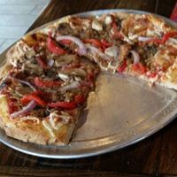 Rosemary Garlic Crust
Spicy Red Sauce
Vegan Cheese
Vegan Crumbles
mushrooms
marinated mushrooms
onions 
roasted red peppers =
YUM!!!!  at Piaza Fresh in Berlin