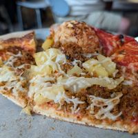  at Wild Tomato Pizza in Fish Creek