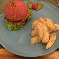 Beetroot whole wheat burger with tempeh filling and potato wedges for 58 rmb at Cloud Kitchen in Beijing