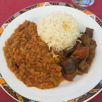 Vegan roasted aubergine with tomatoes, onions and rice at Ganges in Loerrach