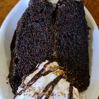 Vegan chocolate fudge cake with vegan cream at Pimento Tea Rooms in Lincoln