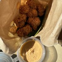 Soooo crispy cauliflower bites with spicy mayo (also yummy on their own)  at Broccoli Revolution - Sukhumvit Rd in Bangkok