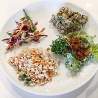 Plate of salad samples at Commodity Juicery. at Commodity Juicery in Vancouver