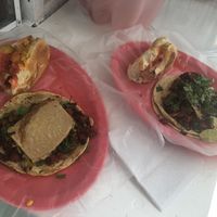 hot dogs, and almond cheese on top of tacos at Gatorta - Food Stand in Mexico City