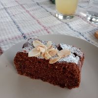 All cakes are vegan!!! 🌷🫶✨ This is the chocolate, coconut, cherry cake which is also gluten-free! at Bioweingut Otto Knaus in Sulztal