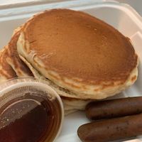 Pancakes with sausage links at New Leaf Cafe in Tampa