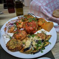 Vegetarian plate with several dishes from vegetarian menu page at Kellari in Crete