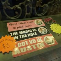 bumper stickers at Voodoo Doughnuts - E 6th St in Austin