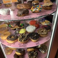 Vegan options are listed on the menu, this is the case that shows all the donuts they have (vegan isn’t listed tho)  at Voodoo Doughnuts - E 6th St in Austin