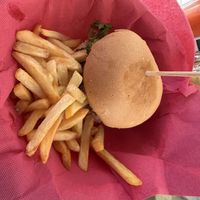 Lentil burger with friesd  at H2O Juice Bar & Vegan Cafe in Fuerteventura