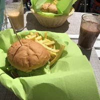 Avocado burger with fries  at H2O Juice Bar & Vegan Cafe in Fuerteventura