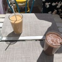 Orange one is passion fruit and the brown one is chocolat and banana   at H2O Juice Bar & Vegan Cafe in Fuerteventura