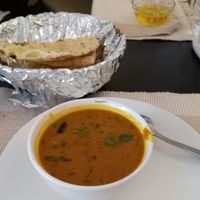 Yellow dalh with onion kulchar at Aniyor Vegetarian Restaurant in Kathmandu