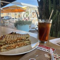 Buffalo Cauliflower panini with vegan cheese   at InfusionTea in Orlando