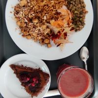 Bulgur burger and tofu mix mango mix juice and lemon cake at Escolha Natura in Lisbon