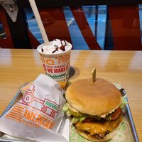 Onion rings, all American burger, cookie dough shake with whipped cream at Next Level Veggie Grill - Hawthorne in Portland