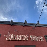 Sign on the outdoor patio  at Burrito Union in Duluth