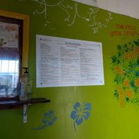 Menu on the wall at Eat Right Delights in Nassau