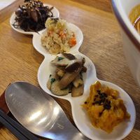 Side dishes served with the curry at Gomacro in Kyoto