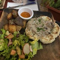 Cauliflower steak with gravy  at Vivo Cafe & Restaurant in West Bay
