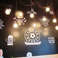 The interesting wall inside at Flower Burger - Viale Vittorio Veneto in Milan