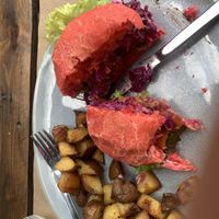 Pink chickpea white bean and beat burger   at BuenaVida Vegan in Tenerife