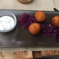 Potato croquettes served with red cabbage  at BuenaVida Vegan in Tenerife