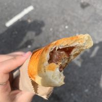 vegan sausage roll with tomato  at Sunrise Organics in Bournemouth