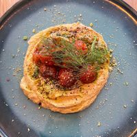 Houmous and tomatoes  at Le Potager de Charlotte in Paris