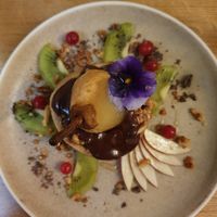 Roasted pear and chocolate dessert at Le Potager de Charlotte in Paris