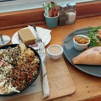 Mixed salads, samosa, and ginger crunch (all vegan) at Potpourri Vegetarian Cafe in Dunedin