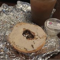 Bagel with house made cashew “cream cheese” & cold brew.  at Pop a Top - E University in Gainesville