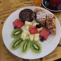 Vegan breakfast with coffee and orange juice at La Licata in Rome