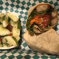 “Chicken” tender wrap with side cucumber salad at Dancing Avocado in Daytona Beach
