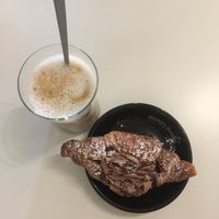 Coffee with soy milk and a chocolate croissant at da Stefy in Udine