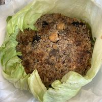 Vegan guac burger in a lettuce bun at Epik Burger in Jacksonville