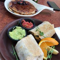 breakfast burrito (pancakes in background) at Go Vegan Cafe in Las Vegas