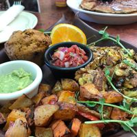 breakfast tofu scramble (pancakes in background) at Go Vegan Cafe in Las Vegas