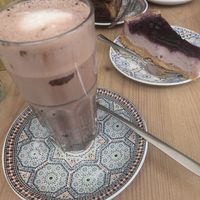 Kakao with blueberry cake at Fancy Foods in Wuppertal
