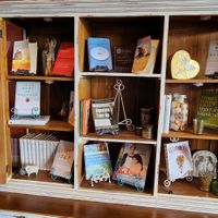 part two of inhouse book library and for sale WFPB references and cookbooks. at GreenFare Organic Cafe in Herndon