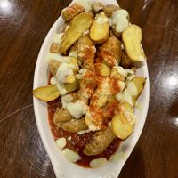 Organic baked potatas bravas appetizer.   at GreenFare Organic Cafe in Herndon