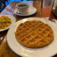 Tofu scramble and vegan waffle with real maple syrup. Watermelon mint mimosa :) at Backwater in Melbourne