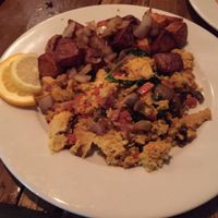 Garden tofu scramble omelette with home fries. at Backwater in Melbourne