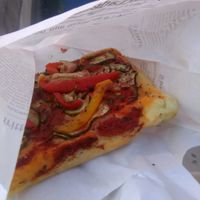Baked pizza by slice at Rialto Biocenter in Venice