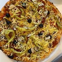 Capriciosa with vegan cheese  at Pizzeria Jolly in Schoenau Am Konigssee