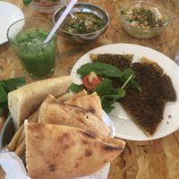 Za3tar bread, hummus, baba ghanoush and bread (and lemon & mint juice) at Shams El Balad Cafe in Amman