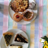 Bought cakes for a vegan cake tasting. Hard to pick a favorite💗but the round cake at the top left of the picture won. at Kaf in Copenhagen