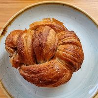 Cardamom bun. Just look at this glorious, sticky, sweet thing. Isn't it beautiful? at Kaf in Copenhagen