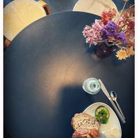 Sourdough Bun with fresh avocado and whipped butter.   at Kaf in Copenhagen